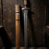 Hand-forged Damascus Viking sword with rosewood handle, bone spacer, and engraved wooden scabbard featuring a holy cross — crafted by Damascus Edges for American collectors.